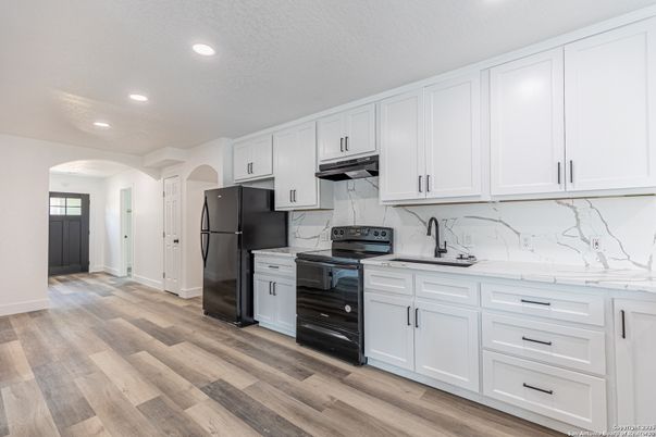 Interior, Kitchen, Marble Walls, Recessed Lighting, Wood Texture Flooring