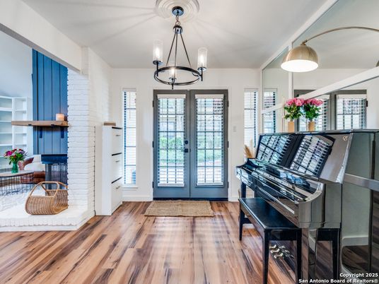 Fireplace, Interior, Pendant Lights, Piano, Wood Texture Flooring