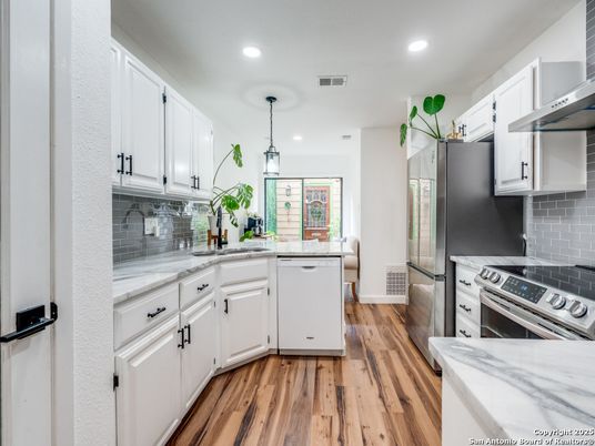 Interior, Kitchen, Pendant Lights, Recessed Lighting, Stainless Steel Appliances, Wood Texture Flooring