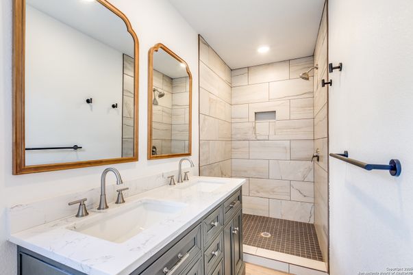 Bathroom, Dual Sink Vanities, Interior, Marble Walls, Recessed Lighting