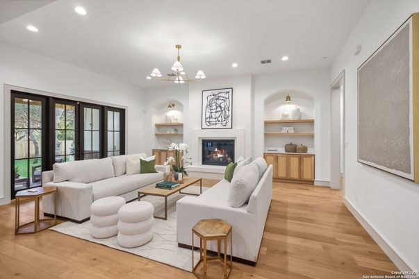 Chandelier, Fireplace, Interior, Living room, Recessed Lighting, Wood Texture Flooring