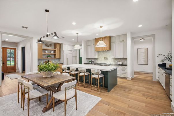 Dining room, Interior, Kitchen, Pendant Lights, Recessed Lighting, Stainless Steel Appliances, Wood Texture Flooring