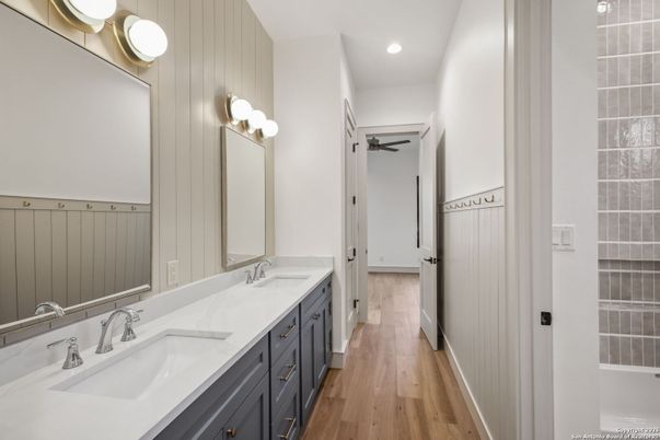 Bathroom, Dual Sink Vanities, Interior, Recessed Lighting, Wood Texture Flooring