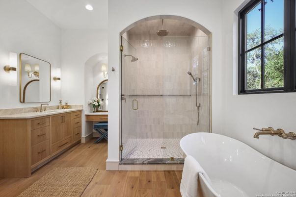 Bathroom, Dual Sink Vanities, Free Standing Baths, Glass Shower, Interior, Recessed Lighting, Wood Texture Flooring