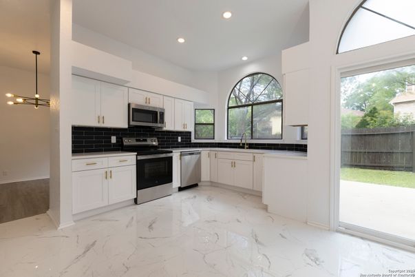 Interior, Kitchen, Marble, Pendant Lights, Recessed Lighting, Stainless Steel Appliances