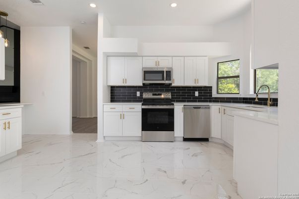 Interior, Kitchen, Marble, Pendant Lights, Recessed Lighting, Stainless Steel Appliances