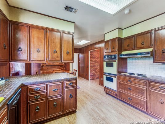 Interior, Kitchen, Tile Countertops, Wood Texture Flooring