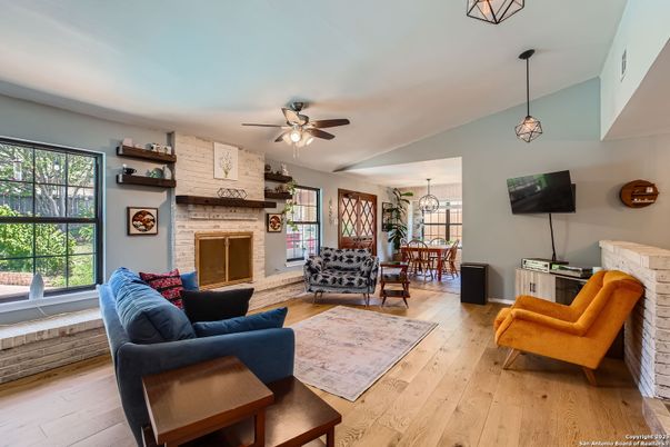 Dining room, Fireplace, Interior, Living room, Pendant Lights, Stone Walls, Wood Texture Flooring