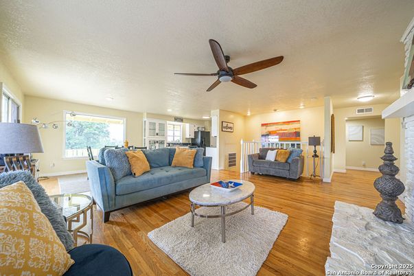 Fireplace, Interior, Living room, Recessed Lighting, Wood Texture Flooring
