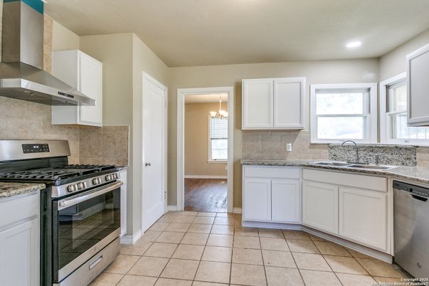 Chandelier, Interior, Kitchen, Recessed Lighting, Stainless Steel Appliances, Wood Texture Flooring