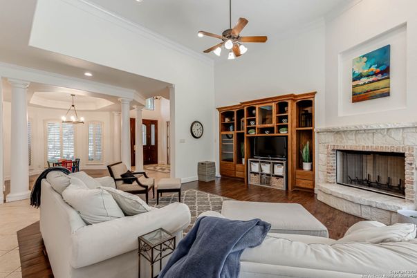 Chandelier, Dining room, Fireplace, Interior, Living room, Recessed Lighting, Wood Texture Flooring