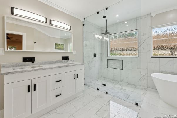 Bathroom, Dual Sink Vanities, Free Standing Baths, Glass Shower, Interior, Marble, Marble Walls, Recessed Lighting