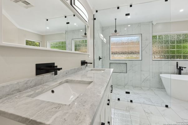Bathroom, Dual Sink Vanities, Free Standing Baths, Glass Shower, Interior, Marble, Marble Walls, Recessed Lighting