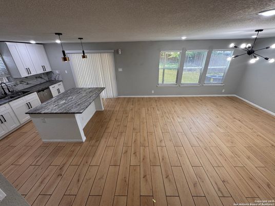 Empty room, Interior, Kitchen, Pendant Lights, Recessed Lighting, Wood Texture Flooring