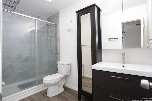 Bathroom, Glass Shower, Interior, Marble Walls, Wood Texture Flooring