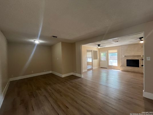 Empty room, Fireplace, Interior, Stone Walls, Wood Texture Flooring