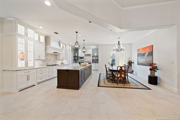 Chandelier, Dining room, Interior, Kitchen, Pendant Lights, Recessed Lighting, Stainless Steel Appliances