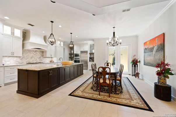 Chandelier, Dining room, Interior, Kitchen, Pendant Lights, Recessed Lighting, Stainless Steel Appliances