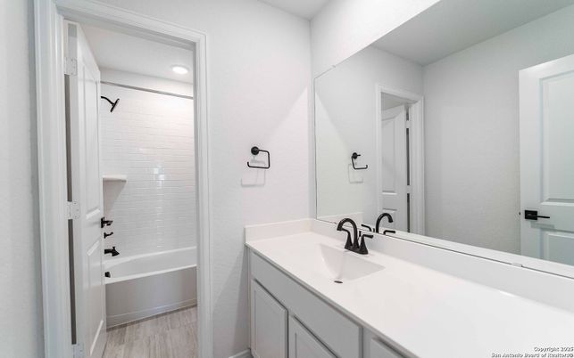Bathroom, Dual Sink Vanities, Interior, Recessed Lighting, Wood Texture Flooring