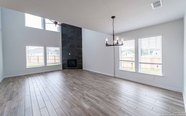 Chandelier, Empty room, Fireplace, Interior, Pendant Lights, Wood Texture Flooring
