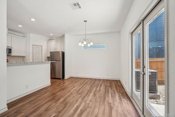 Chandelier, Empty room, Interior, Kitchen, Pendant Lights, Recessed Lighting, Wood Texture Flooring