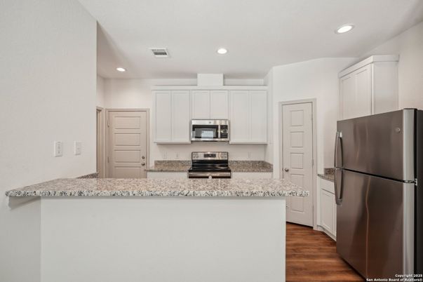 Interior, Kitchen, Recessed Lighting, Stainless Steel Appliances, Wood Texture Flooring