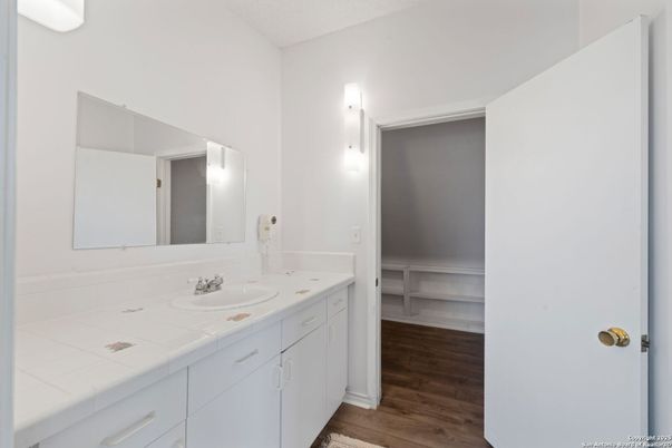 Bathroom, Dual Sink Vanities, Interior, Tile Countertops, Wood Texture Flooring