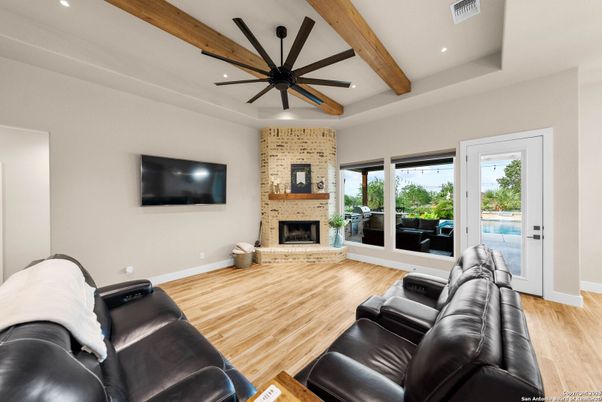 Home Theatre Room, Fireplace, Interior, Living room, Recessed Lighting, Stone Walls, Wooden Beams, Wood Texture Flooring