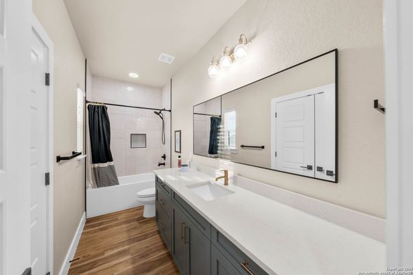 Bathroom, Dual Sink Vanities, Interior, Recessed Lighting, Wood Texture Flooring