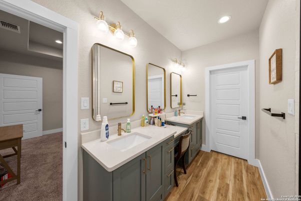 Bathroom, Dual Sink Vanities, Interior, Recessed Lighting, Wood Texture Flooring