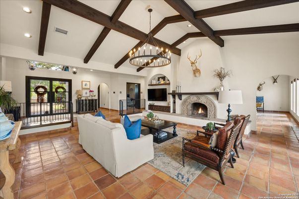 Chandelier, Fireplace, Interior, Living room, Recessed Lighting, Wooden Beams