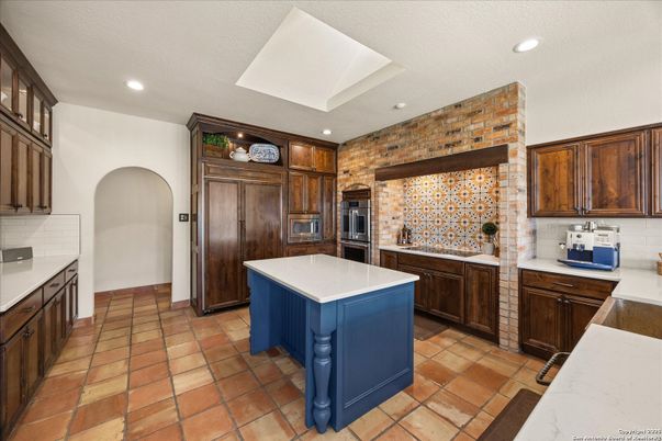 Interior, Kitchen, Recessed Lighting, Stainless Steel Appliances, Stone Walls