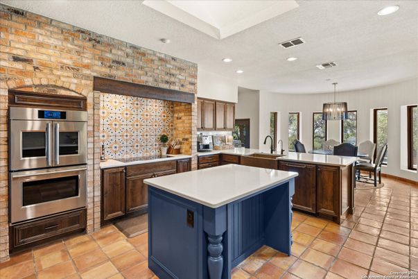 Dining room, Interior, Kitchen, Pendant Lights, Recessed Lighting, Stainless Steel Appliances, Stone Walls