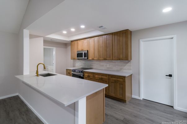 Interior, Kitchen, Recessed Lighting, Stainless Steel Appliances, Wood Texture Flooring