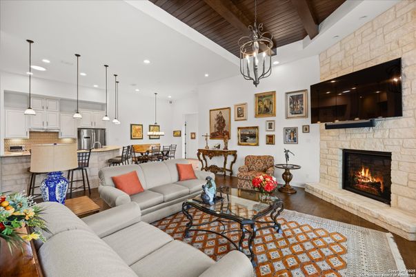 Dining room, Fireplace, Interior, Kitchen, Living room, Pendant Lights, Recessed Lighting, Stainless Steel Appliances, Stone Walls, Wooden Beams, Wooden Ceilings, Wood Texture Flooring