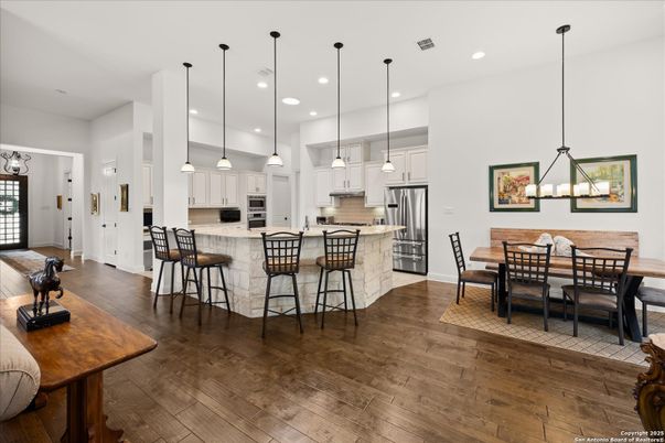 Dining room, Interior, Kitchen, Pendant Lights, Recessed Lighting, Stainless Steel Appliances, Wood Texture Flooring