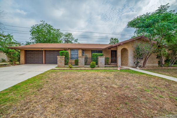 Attached, Backyard, Exterior, Facade, Brick Facade, Ranch