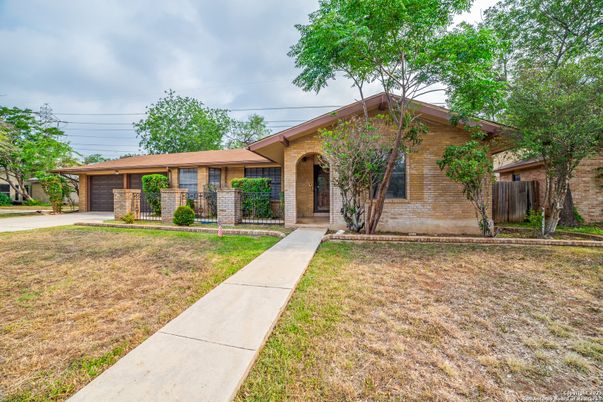 Attached, Backyard, Exterior, Facade, Brick Facade, Ranch