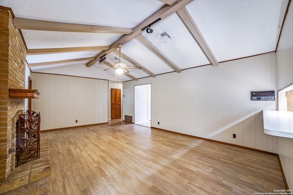 Empty room, Fireplace, Interior, Stone Walls, Wooden Beams, Wood Texture Flooring