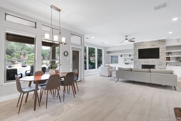 Dining room, Fireplace, Interior, Living room, Pendant Lights, Recessed Lighting, Stone Walls, Wood Texture Flooring