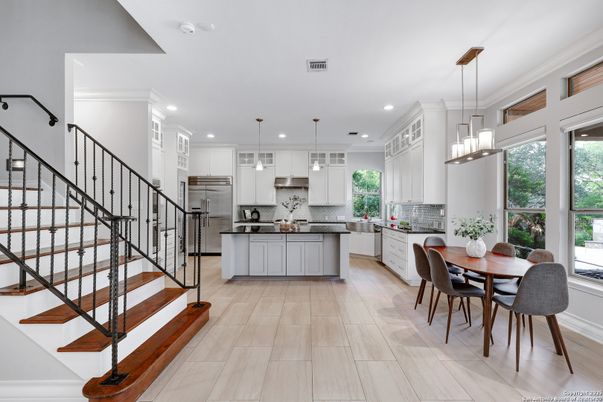 Dining room, Interior, Kitchen, Pendant Lights, Recessed Lighting, Stainless Steel Appliances, Wood Texture Flooring