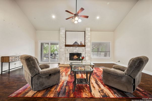 Fireplace, Interior, Living room, Recessed Lighting, Stone Walls, Wood Texture Flooring