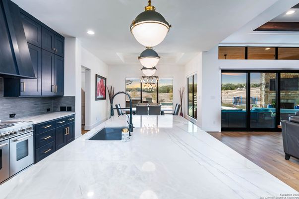 Dining room, Interior, Kitchen, Pendant Lights, Recessed Lighting, Stainless Steel Appliances, Water, Wood Texture Flooring