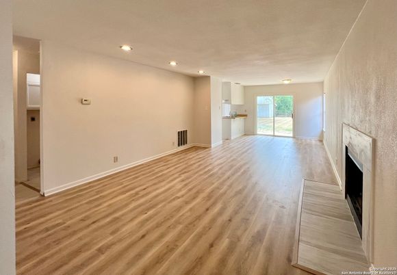 Empty room, Fireplace, Interior, Recessed Lighting, Wood Texture Flooring