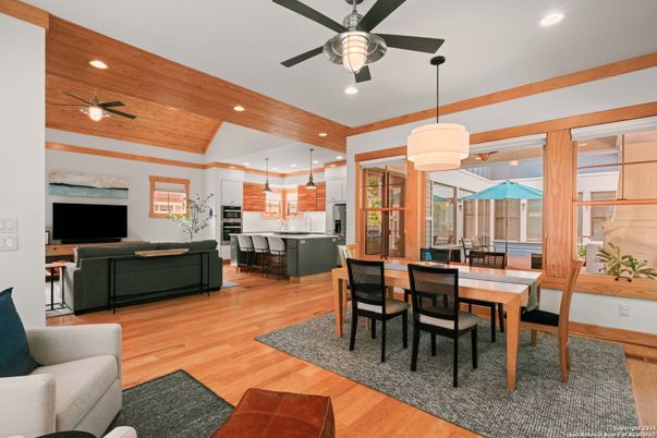 Dining room, Interior, Kitchen, Living room, Pendant Lights, Recessed Lighting, Stainless Steel Appliances, Wooden Ceilings, Wood Texture Flooring
