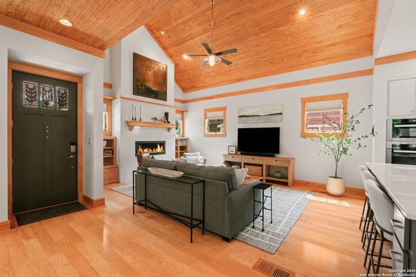 Fireplace, Interior, Living room, Recessed Lighting, Stainless Steel Appliances, Wooden Ceilings, Wood Texture Flooring
