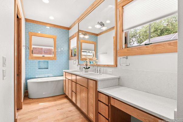 Bathroom, Dual Sink Vanities, Free Standing Baths, Interior, Recessed Lighting, Wood Texture Flooring