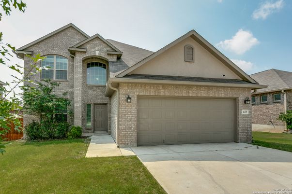 Attached, Exterior, Facade, Brick Facade, Brick Traditional