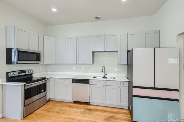 Interior, Kitchen, Recessed Lighting, Stainless Steel Appliances, Wood Texture Flooring