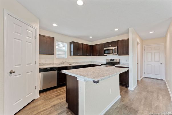 Interior, Kitchen, Recessed Lighting, Stainless Steel Appliances, Wood Texture Flooring